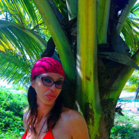 Sunbathing under the palm trees of Sweet Lake, near Clif in Goa.